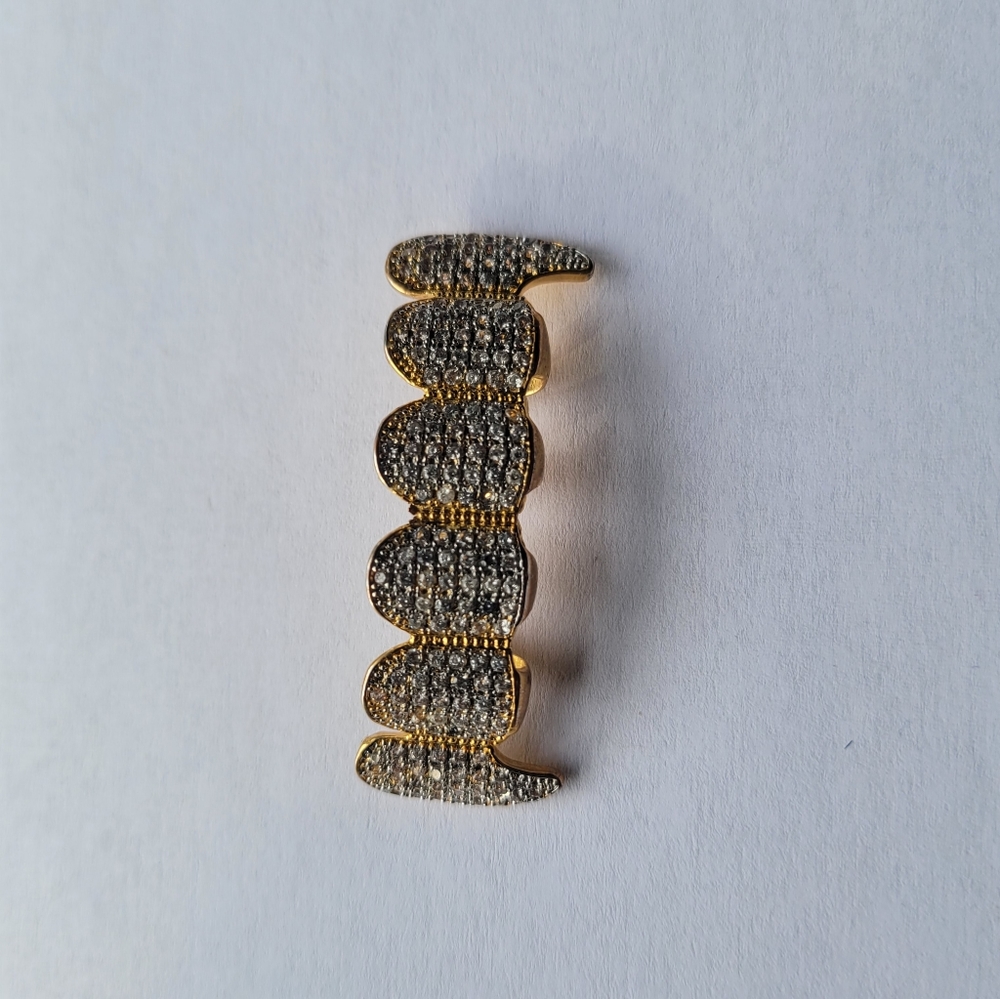 Gold grills with diamond dust